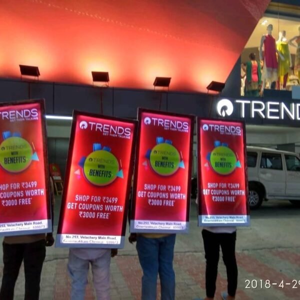 The Look Walker is a wearable billboard with a backlit display, perfect for high-visibility mobile advertising in crowded areas.