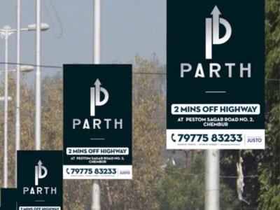 Pole kiosk advertising in Mumbai by ACME Advertising Co., showcasing vibrant street-level branding on high-traffic roads.