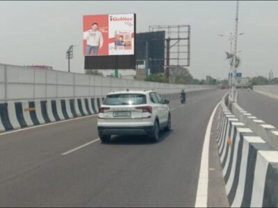 Unipole advertisement on flyover installed by ACME Advertising Co., a leading Unipole Advertising Company in Lucknow.