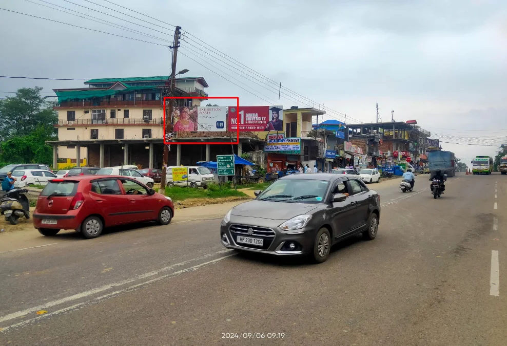 Mandsaur University billboard in semi-urban street ACME Advertising Co., top billboard advertising companies in himachal pradesh, promotes educational branding.
