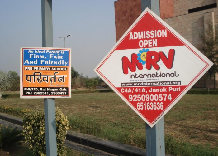 City street pole kiosk advertising space from Acme Advertising Co.