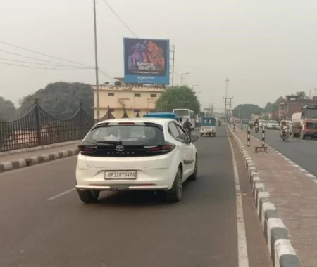 Bhediya movie hoarding by ACME Advertising Co. in Lucknow, featuring actors and 25th Nov release date.