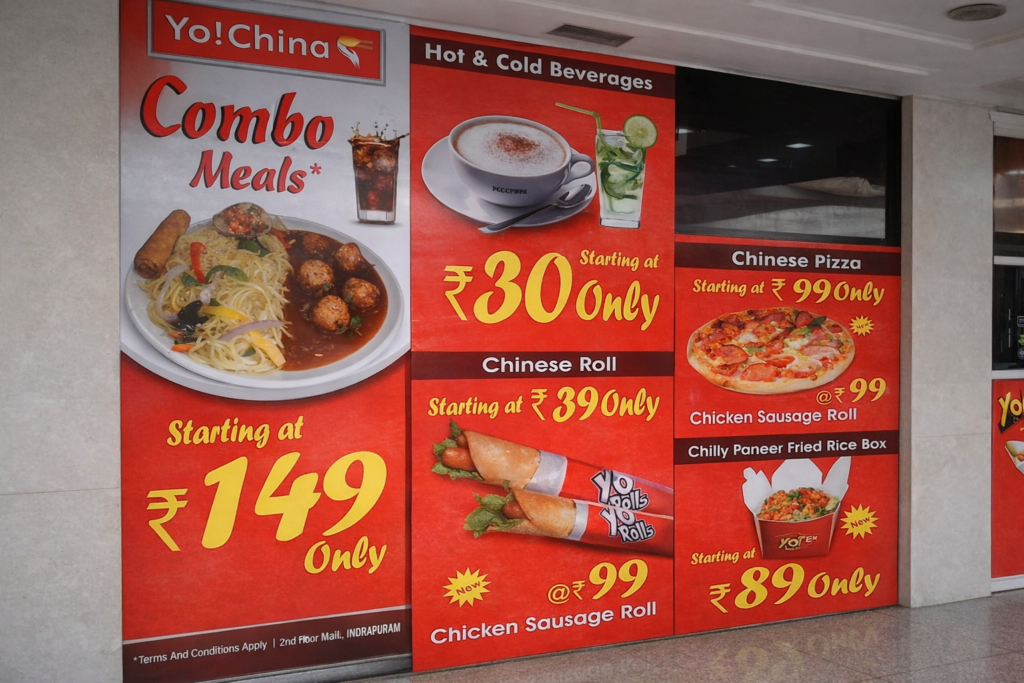Indoor restaurant wall branding featuring food visuals, pricing, and combo meal promotions.