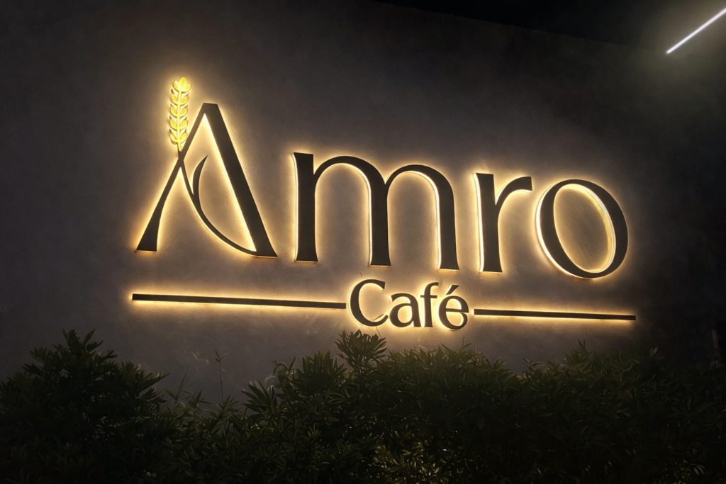 Amro Café exterior illuminated signage highlighting creative signages board advertising for cafes